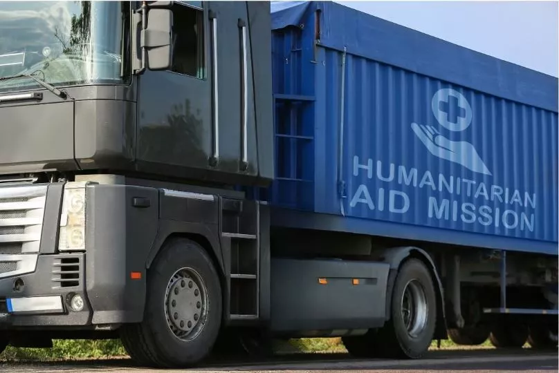 Truck with humanitarian and mission text on the side