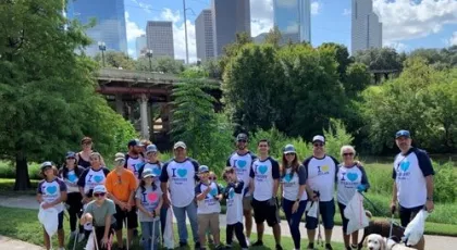 Group of people in park wearing Fracht shirts