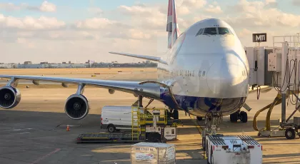 Large airplane at terminal gate