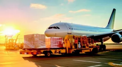 Airplane on runway with cargo 