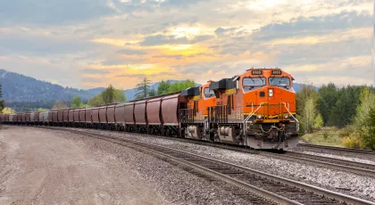 Orange train car on track
