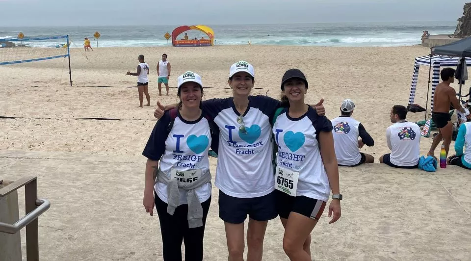 Fracht employees on a beach