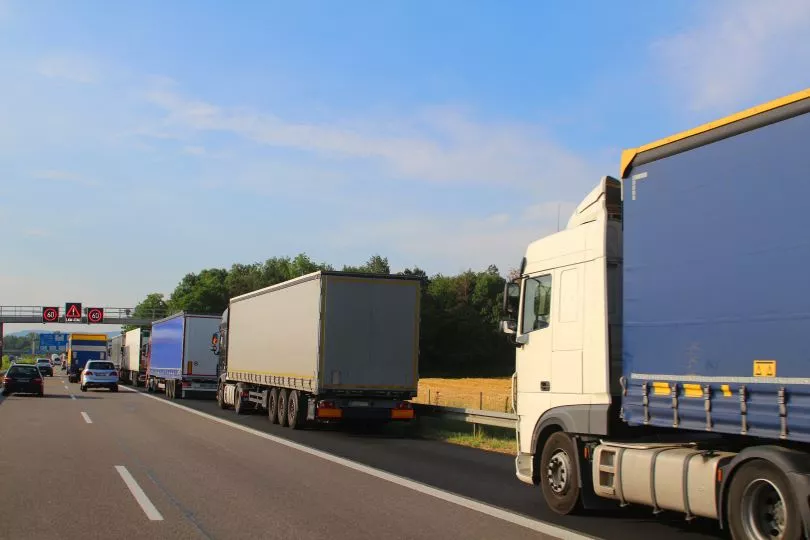 Multiple trucks on a highway