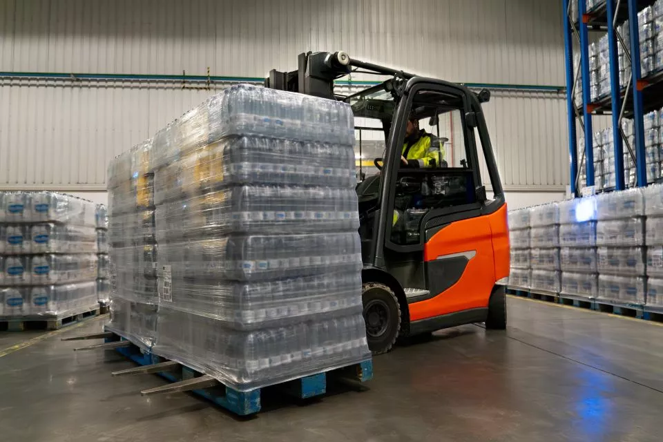 Water being lifted in warehouse