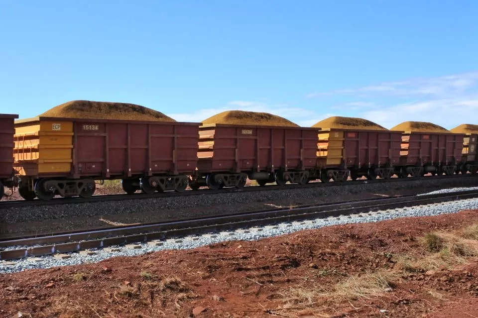 Bulk materials being transported by freight train