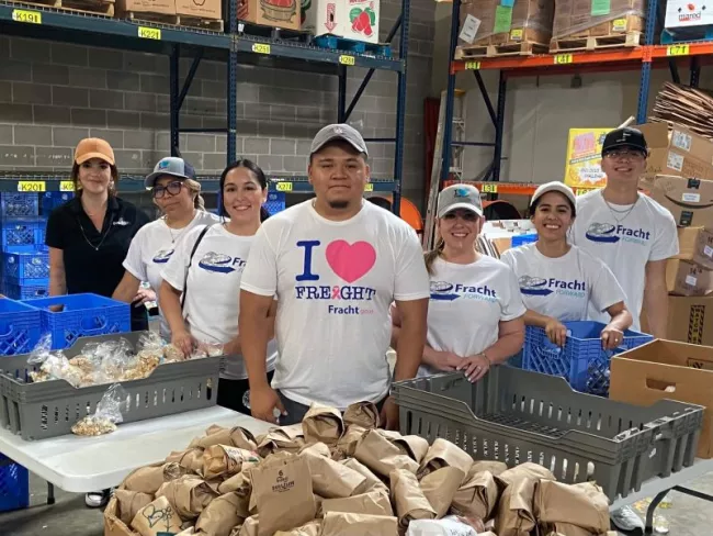 Fracht employees in warehouse